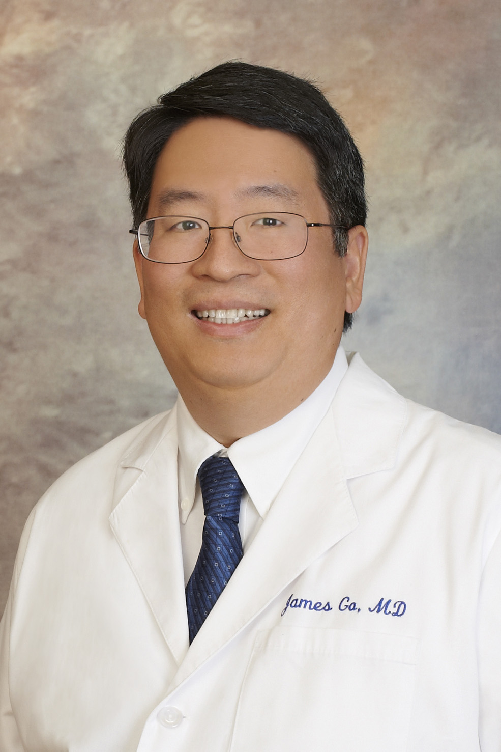 Dr. James Go Logo