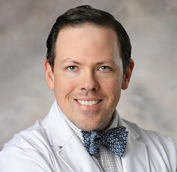 Dr. Daniel Hennessy Logo