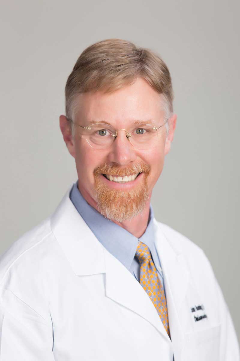 Dr. John Buenting Logo