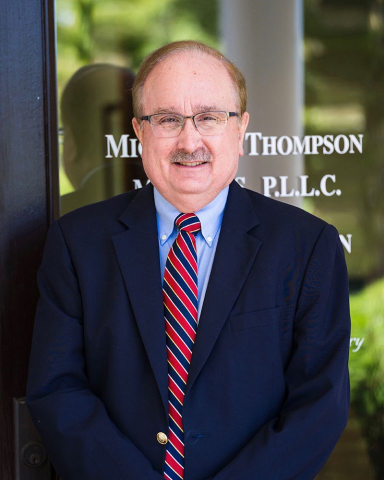 Dr. Michael Thompson Logo